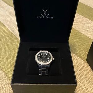 Toy Watch black crystal plasteramic watch. Includes original boxes and extender